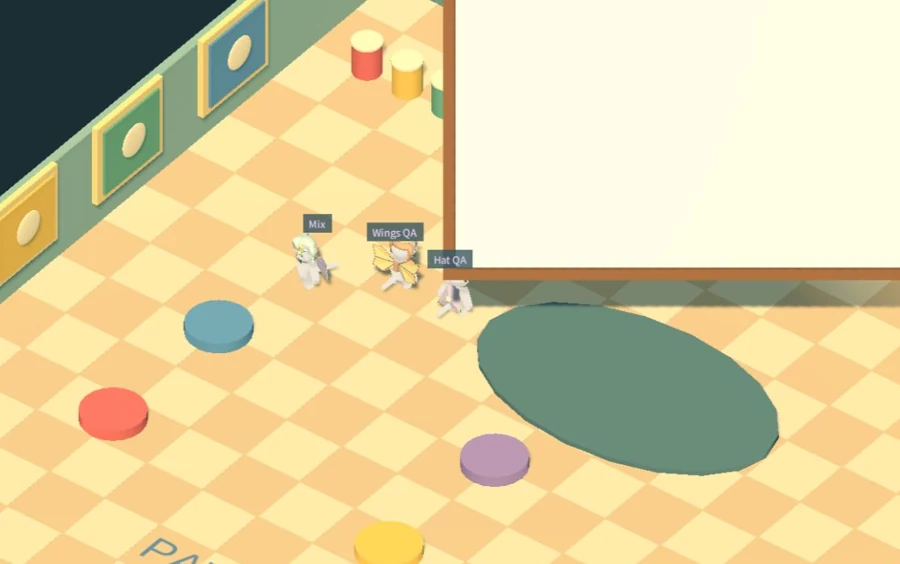 Cats gathered in Pawprint Studio beside the shared drawing board
